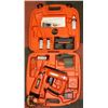 Image 1 : PASLODE NAILER IN ORANGE CASE.