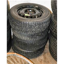 SET OF FOUR 195/60R15 NOKIAN STUDDED TIRES ON RIMS