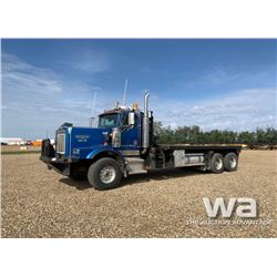 2002 KENWORTH C500B T/A BED TRUCK