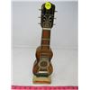 Image 1 : GUITAR SHAPED MUSIC BOX (GLASS) *DECANTER* (HOW DRY AM I?) *BROWN AND GOLD*