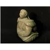 Image 2 : INUIT HAND CARVED SOAP STONE SCULPTURE OF A WOMAN SITTING WITH PAPOOSE, 9" TALL