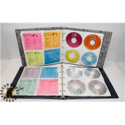 2 BINDERS OF CDS FROM A DJ SERVICE