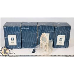 BOX OF SEAGULL ANGEL CANDLE HOLDERS.