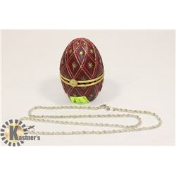 FABRAGE EGG WITH 925 STERLING 30 INCH CHAIN.