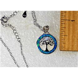 7)  BLUE FIRE OPAL SET IN 925 SILVER