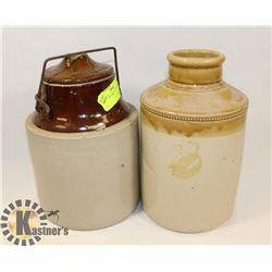 PAIR OF VINTAGE POTTERY JARS.