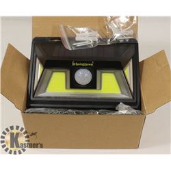 LOT OF 2 NEW SOLAR SECURITY LED LIGHTS