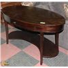 Image 1 : OVAL WOOD DESK (54"X28"X30.5").