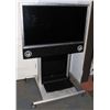 Image 1 : TOMBERG TV IN BUILT IN STAND.