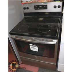 GE 4 BURNER STOVE SELF CLEAN.