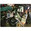 Image 1 : ASSORTED MARINE ENGINE PARTS IN FRONT OF RACKING