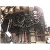 Image 1 : LARGE QUANTITY OF ASSORTED BELTS ON WALL/CEILING