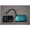 Image 1 : SAMSUNG TABLET POWERS ON - AS IS, AND CANON CAMERA W/ CHARGER