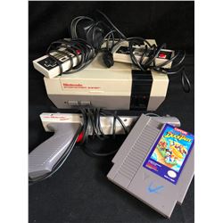 NINTENDO ENTERTAINMENT SYSTEM W/ CONTOLLERS, ZAPPER GUN & GAME