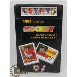 BOX OF OPEECHEE PREMIERE 1991 HOCKEY CARD PACKS.