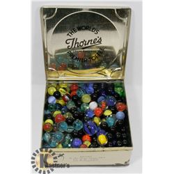 ANTIQUE TIN FULL OF OLD MARBLES.