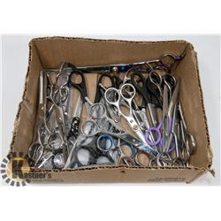 FLAT OF HAIRDRESSER SCISSORS