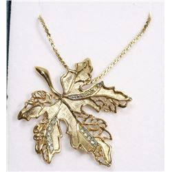 GOLD TONED MAPLE LEAF PENDANT W/ CRYSTAL ACCENTS