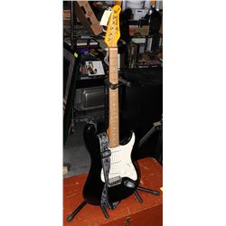 JAY TURSER ELECTRIC GUITAR WITH STAND.