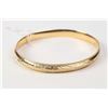 Image 1 : Ladies 14kt yellow gold hinged bracelet. Retail replacement value $885.00