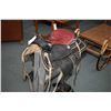 Image 1 : Western Rawhide tooled leather parade saddle with nail head decoration, wood stirrups and leather ta