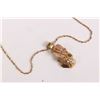 Image 1 : Ladies 10kt yellow gold neck chain and a 10kt tri-gold "Black Hill's Gold" pendant