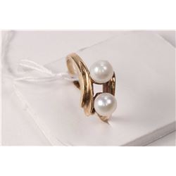 Genuine freshwater pearl strand 100" in length and a 10kt yellow gold and double pearl ring