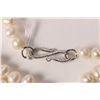 Image 3 : Genuine freshwater pearl strand 100" in length and a 10kt yellow gold and double pearl ring