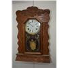 Image 1 : Antique Arthur Pequegnat chiming gingerbread clock with decorative gilt pendulum