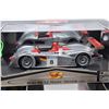 Image 3 : Three new in box 1:18 scale Maisto die cast collector cars including Audi R8, Porsche 911 GT1 and a 