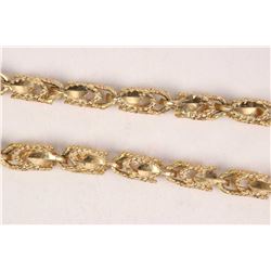 10kt yellow gold fancy link neck chain, 22" in length. Retail replacement value $ 1,685.00