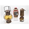 Image 1 : Three vintage kerosene lamps including one marked "Industrial Rubber Product Ltd. London, Indupro la