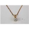 Image 1 : Ladies 10kt yellow gold 15" neck chain and a brilliant cut 0.21ct diamond solitaire and 10kt yellow 