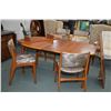 Image 1 : Danish made mid century modern teak dining table with three insert leaves, four matching chairs plus