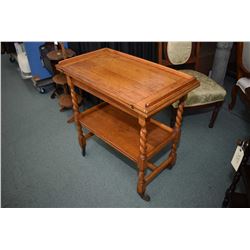 Quarter cut oak, barley twist fold over tea wagon/ games table with original castors and undershelf