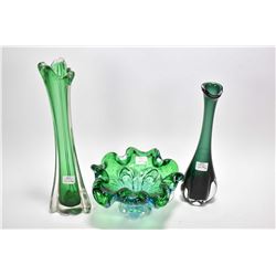 Four pieces of art glass including a bubble glass green center bowl, and two cased green and colourl