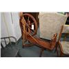 Image 2 : Antique spinning wheel and an antique spindle back arm chair