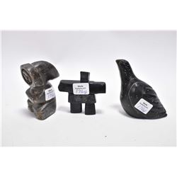 Three carved soapstones including a bird, a figure 3 1/2  in height and signed Ken Gough and an inuk