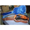 Image 1 : Two vintage musical instruments including a Melody King six string guitar in hard case and a violin