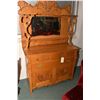 Image 1 : Antique Canadiana oak sideboard with multiple doors and drawers in base and tall bevelled mirrored b