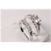 Image 2 : Ladies 14kt white gold and diamond ring set with six princess cut white diamonds of approximately .4