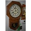 Image 1 : Antique oak cased wall mount clock with 31 day calendar and decorative visible pendulum