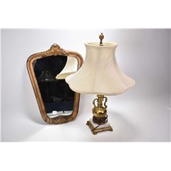 Gilt framed vintage wall mirror and a urn style brass and marble table lamp