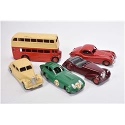 Five vintage Dinky Toys including Bristol 450 #163, Jaguar # 157, Riley # 40A, double decker bus # 2