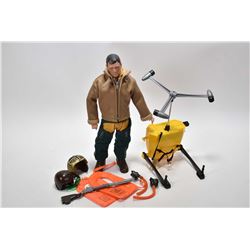 Vintage G.I. Joe action figure patented 1964 with accessories including helicopter back pack, two he