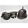 Image 1 : Two military helmets and an officer's hat