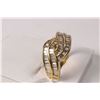 Image 1 : Ladies 18kt yellow gold and diamond ring set with 1.25ct of baguette cut white diamonds. Retail repl