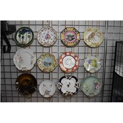 Twelve antique decorator plates including handpainted Limoges, Royal Vista pictorial plate, R. S pla