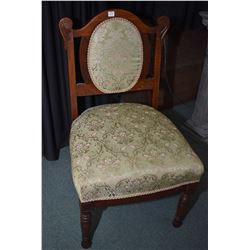 Antique wood framed side chair with upholstered seat and cameo back