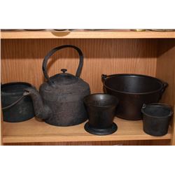 Shelf lot of vintage collectibles including frying pans, cooking pots, waffle maker, pestal, etc.